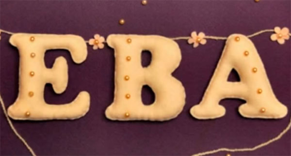 Мягкие буквы, выложенные в имя"Ева"